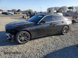 2019 BMW 3 Series 330i with VIN WBA5R1C50KFH09519, listed as a Copart auction lot 46501075 with 75,067 mi miles and Salvage Title. Bid and sale history available at carsss.com. Image 1.