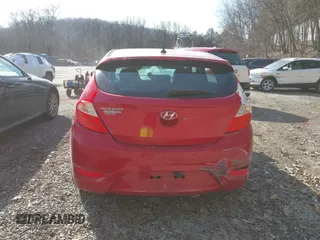 2015 Hyundai Accent Sport with VIN KMHCU5AE5FU200846, listed as a IAAI auction lot 41758805 with 84,987 mi miles. Bid and sale history available at carsss.com. Image 17.