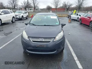2012 Ford Fiesta SE with VIN 3FADP4BJ0CM155729, listed as a IAAI auction lot 41800447 with 90,091 mi miles. Bid and sale history available at carsss.com. Image 12.