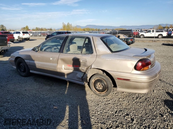 1996 Pontiac Grand Am SE2 with VIN 1G2NE52T3TC834038, listed as a Copart auction lot 76610794 with 140,379 mi miles and Salvage Title. Bid and sale history available at carsss.com. Image 2.