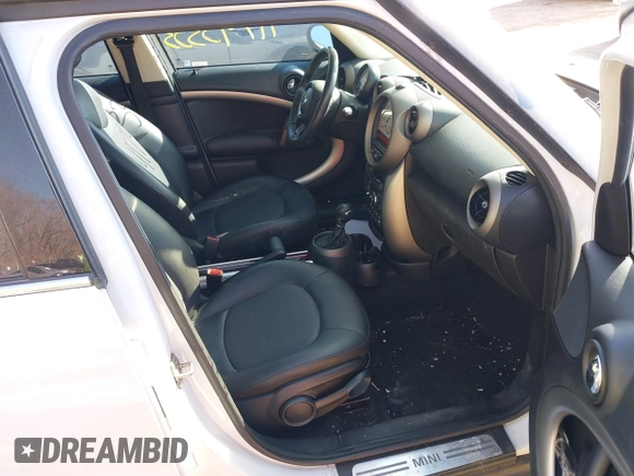 2012 MINI Countryman z VIN WMWZB3C51CWM03056, wystawiony jako IAAI lot #41743353 z przebiegiem 117 290 mil mil oraz . Historia ofert i sprzedaży dostępna na DreamBid. Obrazek 5.