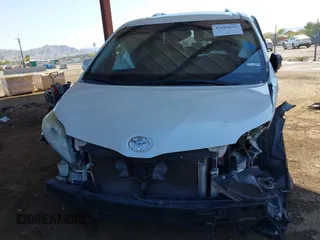 2015 Toyota Sienna XLE with VIN 5TDYK3DC8FS629577, listed as a IAAI auction lot 42019641 with 173,259 mi miles. Bid and sale history available at carsss.com. Image 12.