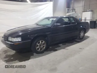 2000 Cadillac Eldorado Touring ETC z VIN 1G6ET1294YU144883, wystawiony jako Copart lot #80979854 z przebiegiem 89 271 mil mil oraz Tytuł czysty. Historia ofert i sprzedaży dostępna na DreamBid. Obrazek 1.