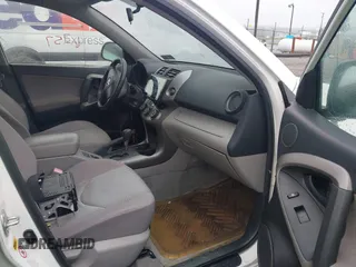 2006 Toyota RAV4 with VIN JTMBD33VX65015543, listed as a IAAI auction lot 41986857 with 124,709 mi miles. Bid and sale history available at carsss.com. Image 5.