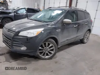 2014 Ford Escape SE with VIN 1FMCU9GXXEUD09124, listed as a IAAI auction lot 41747925 with 147,996 mi miles and . Bid and sale history available at DreamBid. Image 2.