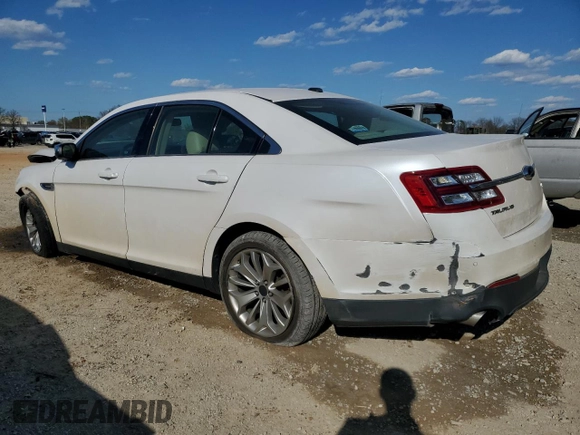 2015 Ford Taurus Limited z VIN 1FAHP2J8XFG123759, wystawiony jako Copart lot #50548205 z przebiegiem 128 266 mil mil oraz Szkoda całkowita • Salvage title. Historia ofert i sprzedaży dostępna na DreamBid. Obrazek 2.