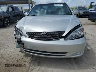 2004 Toyota Camry LE z VIN 4T1BE32K34U305013, wystawiony jako Copart lot #60912085 z przebiegiem 127 247 mil mil oraz Szkoda całkowita • Salvage title. Historia ofert i sprzedaży dostępna na DreamBid. Obrazek 5.
