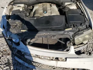 2004 BMW 7 Series 745i with VIN WBAGL63484DP68795, listed as a Copart auction lot 77201084 with 134,044 mi miles and Salvage Title. Bid and sale history available at DreamBid. Image 11.