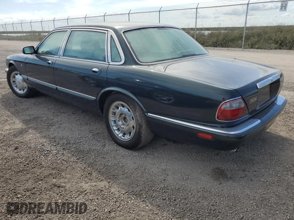 1999 Jaguar XJ with VIN SAJKX6047XC861227, listed as a Copart auction lot 75007414 with Not provided miles and Salvage title. Bid and sale history available at DreamBid. Image 2.