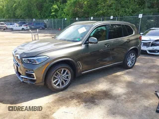 2021 BMW X5 xDrive40i with VIN 5UXCR6C06M9G21960, listed as a IAAI auction lot 42315496 with 41,580 mi miles and . Bid and sale history available at DreamBid. Image 2.