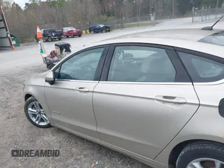 2018 Ford Fusion S z VIN 3FA6P0UU0JR157005, wystawiony jako IAAI lot #41689881 z przebiegiem Nie podano mil oraz . Historia ofert i sprzedaży dostępna na DreamBid. Obrazek 13.