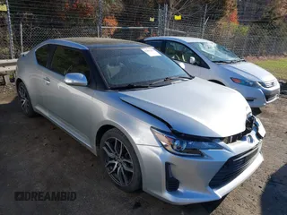 2014 Scion tC with VIN JTKJF5C74E3088669, listed as a IAAI auction lot 41891175 with 86,160 mi miles. Bid and sale history available at carsss.com. Image 1.