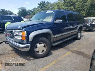 1999 GMC Suburban z VIN 3GKFK16R2XG544767, wystawiony jako Copart lot #67078414 z przebiegiem 154 145 mil mil oraz Szkoda całkowita • Salvage title. Historia ofert i sprzedaży dostępna na DreamBid. Obrazek 1.