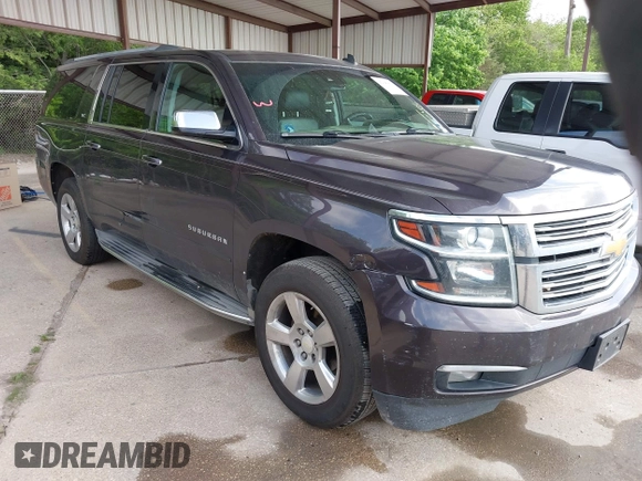 2015 Chevrolet Suburban LTZ with VIN 1GNSCKKC7FR272138, listed as a IAAI auction lot 42047823 with 198,314 mi miles and . Bid and sale history available at DreamBid. Image 1.