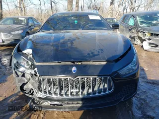 2014 Maserati Ghibli z VIN ZAM57XSA4E1090315, wystawiony jako IAAI lot #41423507 z przebiegiem 115 323 mil mil oraz . Historia ofert i sprzedaży dostępna na DreamBid. Obrazek 13.