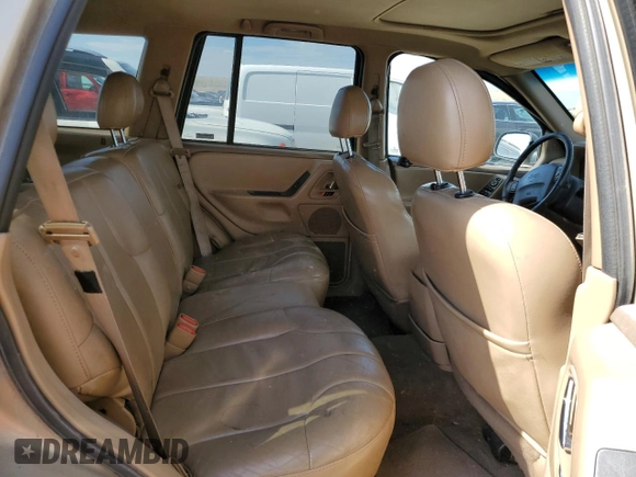 2000 Jeep Grand Cherokee Laredo with VIN 1J4GW48S6YC304447, listed as a Copart auction lot 58001035 with Not provided miles and Clean title. Bid and sale history available at DreamBid. Image 10.