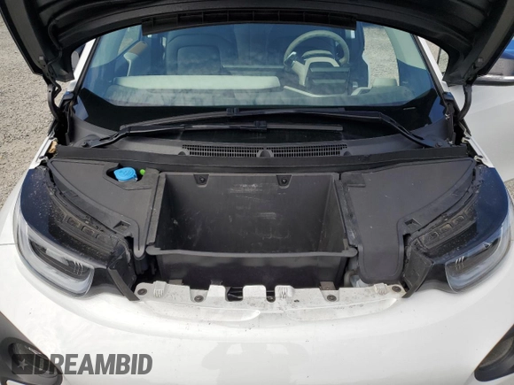 2017 BMW i3 z VIN WBY1Z8C32HV890898, wystawiony jako Copart lot #57968095 z przebiegiem 76 806 mil mil oraz Szkody całkowita. Historia ofert i sprzedaży dostępna na DreamBid. Obrazek 12.