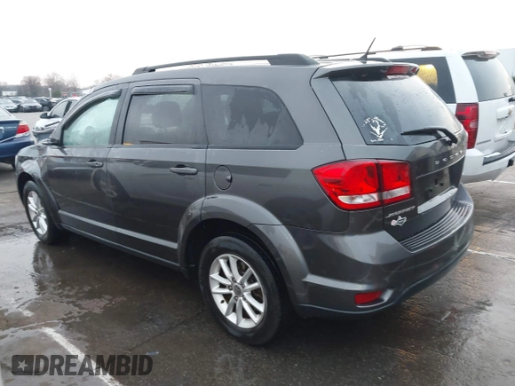 2015 Dodge Journey SXT with VIN 3C4PDCBB7FT735721, listed as a IAAI auction lot 41775824 with 113,446 mi miles and . Bid and sale history available at DreamBid. Image 14.