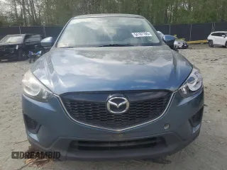 2015 Mazda CX-5 Sport with VIN JM3KE2BE9F0462541, listed as a Copart auction lot 54197105 with 236,682 mi miles and Clean Title. Bid and sale history available at carsss.com. Image 5.
