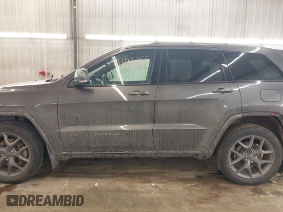 2021 Jeep Grand Cherokee 80th Anniversary z VIN 1C4RJFBG9MC580645, wystawiony jako IAAI lot #41398269 z przebiegiem 79 057 mil mil oraz . Historia ofert i sprzedaży dostępna na DreamBid. Obrazek 14.