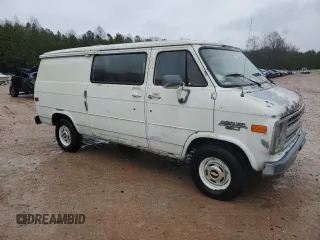 1986 Chevrolet Chevy Van z VIN 1GCEG25N0G7172290, wystawiony jako Copart lot #84010474 z przebiegiem 90 574 mil mil oraz Czysty tytuł • Clean title. Historia ofert i sprzedaży dostępna na DreamBid. Obrazek 4.