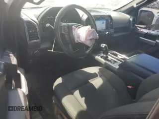 2018 Ford F-150 XL with VIN 1FTEW1CGXJFB40297, listed as a Copart auction lot 69642404 with 92,561 mi miles and Salvage title. Bid and sale history available at DreamBid. Image 8.