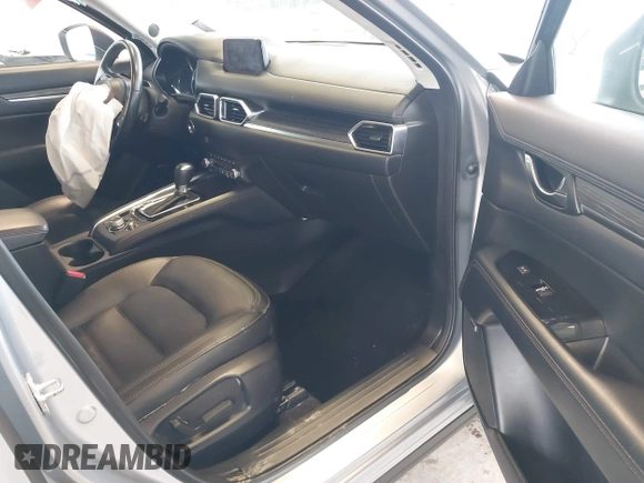 2020 Mazda CX-5 Grand Touring with VIN JM3KFADM0L0738693, listed as a IAAI auction lot 41725906 with 63,629 mi miles. Bid and sale history available at carsss.com. Image 5.