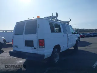 2013 Ford Econoline Cargo Commercial with VIN 1FTNE2EL1DDB27599, listed as a IAAI auction lot 41878865 with 179,802 mi miles and . Bid and sale history available at DreamBid. Image 4.