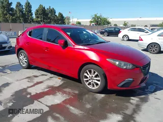 2014 Mazda 3 i Grand Touring z VIN JM1BM1M72E1201457, wystawiony jako IAAI lot #42233692 z przebiegiem 112 168 mil mil oraz . Historia ofert i sprzedaży dostępna na DreamBid. Obrazek 1.