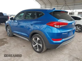 2018 Hyundai Tucson Sport with VIN KM8J33AL0JU803368, listed as a IAAI auction lot 41937235 with 64,163 mi miles and . Bid and sale history available at DreamBid. Image 3.