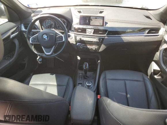 2021 BMW X1 sDrive28i z VIN WBXJG7C04M5T32801, wystawiony jako Copart lot #52046425 z przebiegiem 45 584 mil mil oraz Szkody całkowita. Historia ofert i sprzedaży dostępna na DreamBid. Obrazek 8.