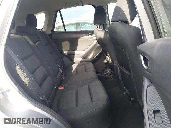 2015 Mazda CX-5 Touring with VIN JM3KE2CYXF0435583, listed as a IAAI auction lot 41737810 with 107,270 mi miles and . Bid and sale history available at DreamBid. Image 8.