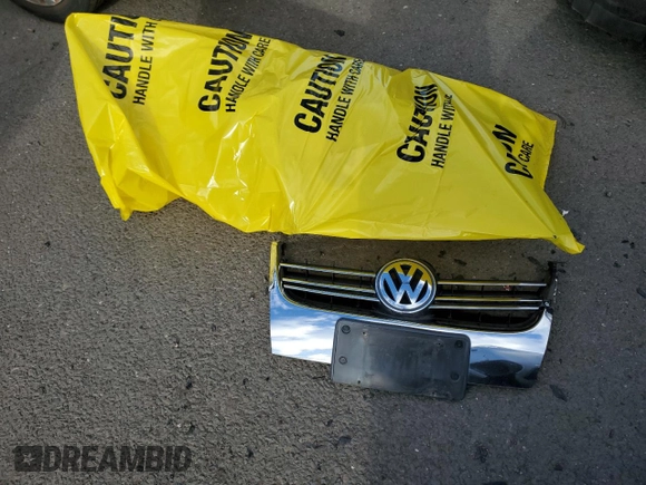 2009 Volkswagen Jetta z VIN 3VWHZ71KX9M011693, wystawiony jako Copart lot #87076904 z przebiegiem 157 478 mil mil oraz Szkoda całkowita • Salvage title. Historia ofert i sprzedaży dostępna na DreamBid. Obrazek 12.