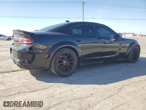 2020 Dodge Charger Scat Pack z VIN 2C3CDXGJ9LH164750, wystawiony jako Copart lot #49712175 z przebiegiem 42 400 mil mil oraz Szkoda całkowita • Salvage title. Historia ofert i sprzedaży dostępna na DreamBid. Obrazek 3.