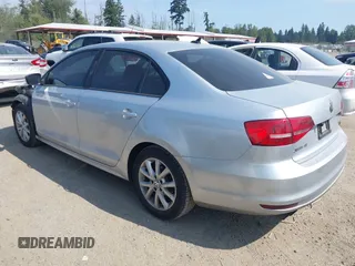 2015 Volkswagen Jetta Sport with VIN 3VWD17AJ0FM271660, listed as a IAAI auction lot 42527496 with 115,008 mi miles and . Bid and sale history available at DreamBid. Image 3.