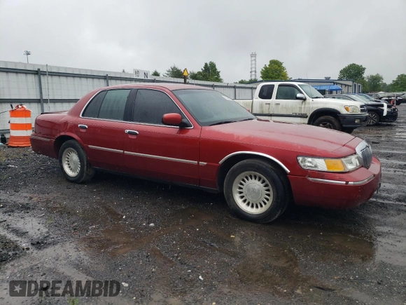 1999 Mercury Grand Marquis LS с VIN 2MEFM75W9XX701991, выставлен на аукционе Copart как лот 58388085 с пробегом 163 160 миль миль и Списание • Salvage title. История ставок и продаж доступна на DreamBid. Изображение 4.