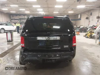 2012 Honda Pilot Touring with VIN 5FNYF4H91CB067014, listed as a IAAI auction lot 41749402 with 151,248 mi miles. Bid and sale history available at carsss.com. Image 16.