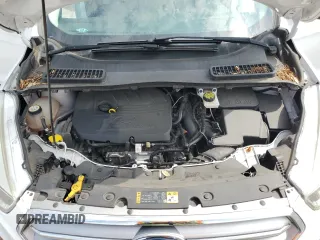 2017 Ford Escape SE z VIN 1FMCU0GD9HUE38848, wystawiony jako Copart lot #56859745 z przebiegiem 69 404 mil mil oraz Szkoda całkowita • Salvage title. Historia ofert i sprzedaży dostępna na DreamBid. Obrazek 12.