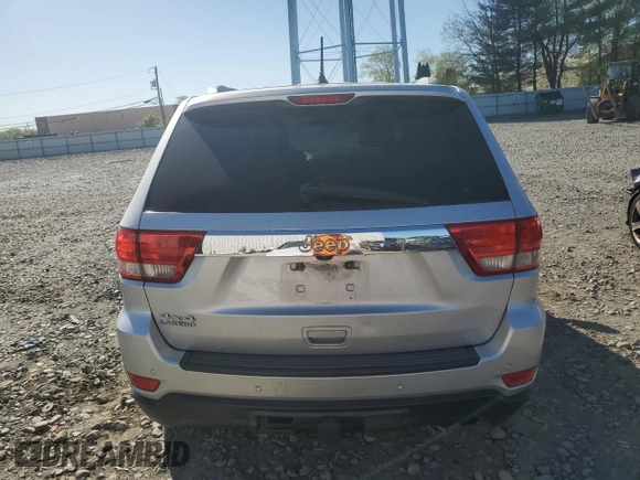2011 Jeep Grand Cherokee Laredo with VIN 1J4RR4GG1BC714058, listed as a Copart auction lot 54974435 with 201,329 mi miles and Clean Title. Bid and sale history available at carsss.com. Image 6.