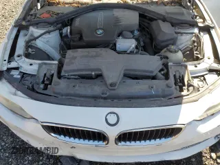 2015 BMW 4 Series 428i z VIN WBA4A9C53FGL85500, wystawiony jako Copart lot #50004575 z przebiegiem 129 018 mil mil oraz Szkoda całkowita • Salvage title. Historia ofert i sprzedaży dostępna na DreamBid. Obrazek 11.