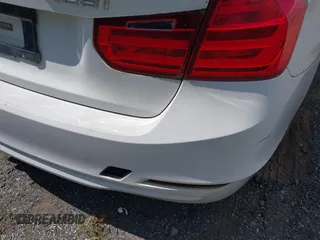 2014 BMW 3 Series 328i z VIN WBA3A5C51EP603386, wystawiony jako IAAI lot #42343104 z przebiegiem Nie podano mil oraz . Historia ofert i sprzedaży dostępna na DreamBid. Obrazek 16.