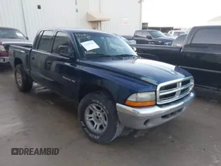 2001 Dodge Dakota z VIN 1B7HL2AX71S328362, wystawiony jako IAAI lot #41965368 z przebiegiem Nie podano mil oraz . Historia ofert i sprzedaży dostępna na DreamBid. Obrazek 1.