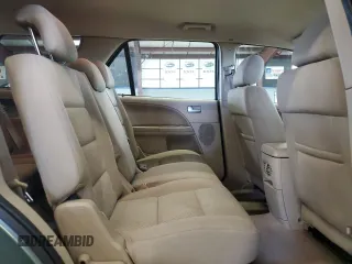 2005 Ford Freestyle SEL z VIN 1FMDK02135GA60009, wystawiony jako Copart lot #52852755 z przebiegiem 248 780 mil mil oraz Szkody całkowita. Historia ofert i sprzedaży dostępna na DreamBid. Obrazek 11.