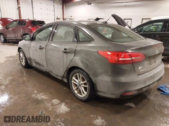 2015 Ford Focus SE with VIN 1FADP3F2XFL342480, listed as a IAAI auction lot 41607487 with 103,530 mi miles. Bid and sale history available at carsss.com. Image 3.