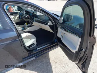 2018 BMW 5 Series M550i xDrive with VIN WBAJB9C55JB286036, listed as a IAAI auction lot 41738640 with 79,049 mi miles and . Bid and sale history available at DreamBid. Image 5.