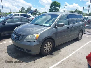 2008 Honda Odyssey EX-L z VIN 5FNRL38798B103173, wystawiony jako IAAI lot #42186360 z przebiegiem 207 341 mil mil oraz . Historia ofert i sprzedaży dostępna na DreamBid. Obrazek 2.