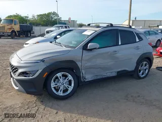 2022 Hyundai Kona SEL with VIN KM8K32AB2NU793938, listed as a IAAI auction lot 41889055 with 49,969 mi miles. Bid and sale history available at carsss.com. Image 2.