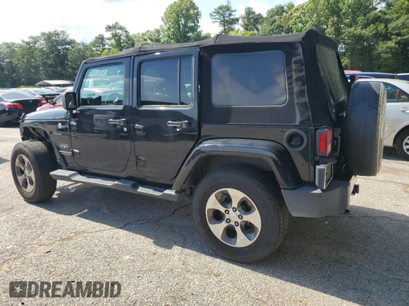 2016 Jeep Wrangler Unlimited Sahara z VIN 1C4BJWEG3GL115814, wystawiony jako Copart lot #62281895 z przebiegiem 75 039 mil mil oraz Szkoda całkowita • Salvage title. Historia ofert i sprzedaży dostępna na DreamBid. Obrazek 2.