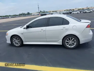 2016 Mitsubishi Lancer ES z VIN JA32U2FU7GU000923, wystawiony jako IAAI lot #42238951 z przebiegiem 134 955 mil mil oraz . Historia ofert i sprzedaży dostępna na DreamBid. Obrazek 14.