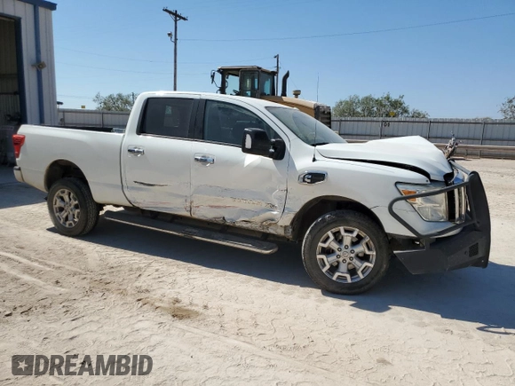2016 Nissan Titan XD PRO-4X with VIN 1N6BA1F41GN510616, listed as a Copart auction lot 76314474 with 167,093 mi miles and Salvage Title. Bid and sale history available at carsss.com. Image 4.
